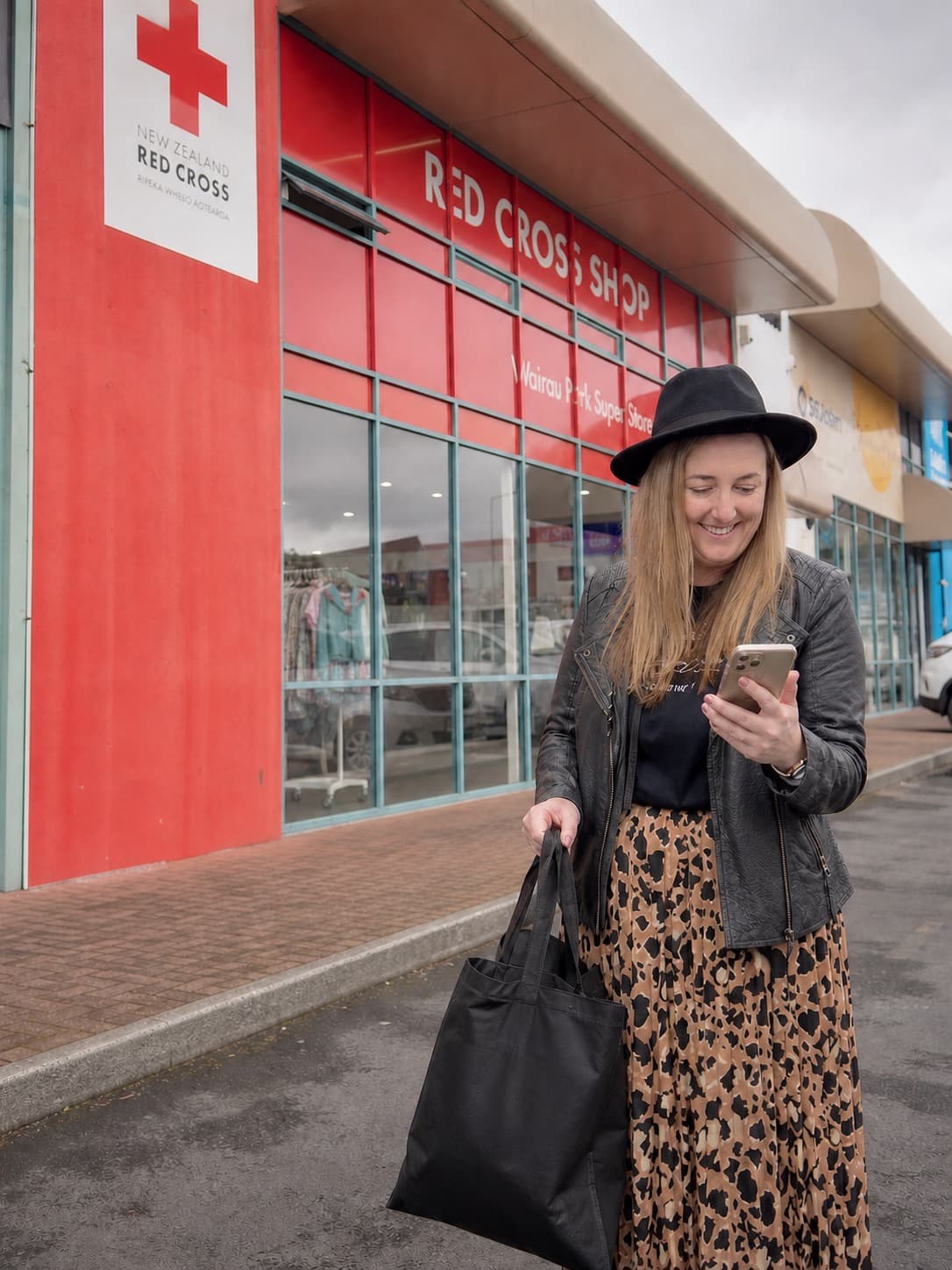 Claire Byrne checking Op Spot outside a Red Cross Shop